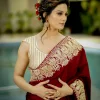 Maroon Pure Silk Saree with Gold Tilla Embroidery model close up