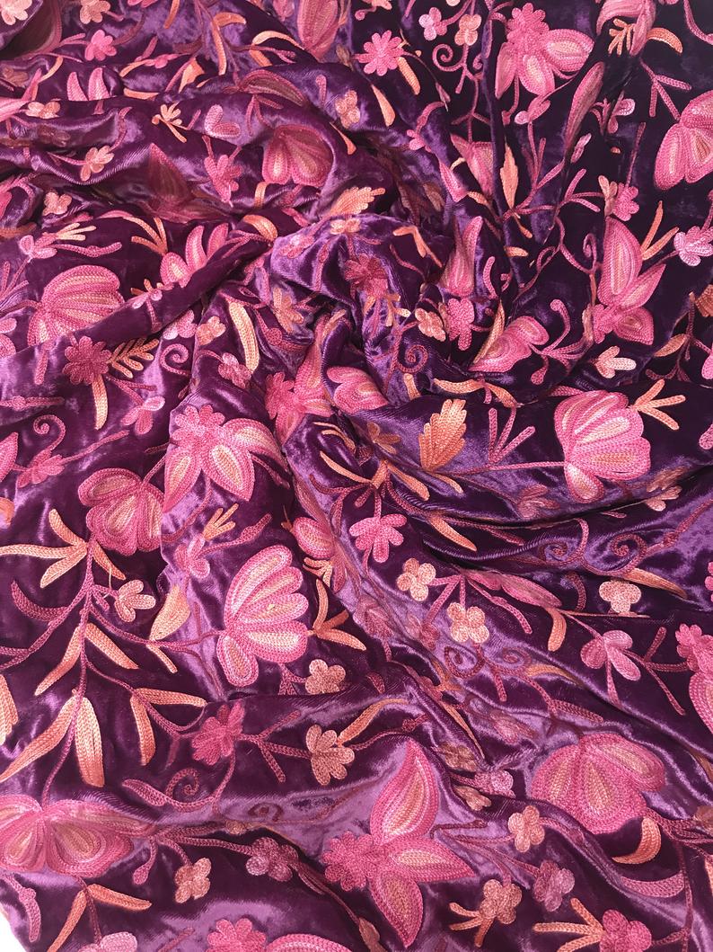 Embroidered on sale velvet fabric