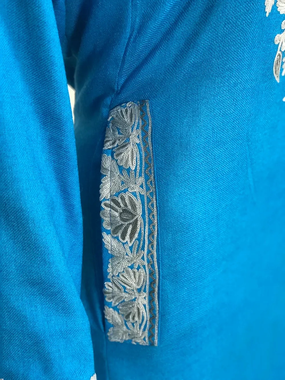 Turquoise Woollen Phiran with Aari Embroidery & Half Band Collar