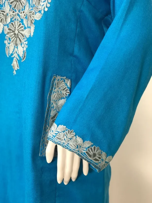 Turquoise Woollen Phiran with Aari Embroidery & Half Band Collar