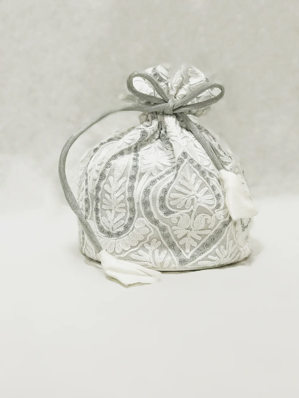 Georgette Zari and Aari Jaal Embroidered White Potli Bag
