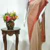 Nude Beige Modal Silk Kani Saree with Floral an Paisley Pallu Design