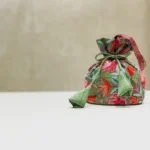 Art Raw Silk Aari Jaal Embroidered Sage Green Potli Bag