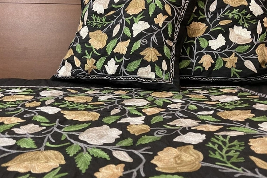 Designer embroidered bed cover
